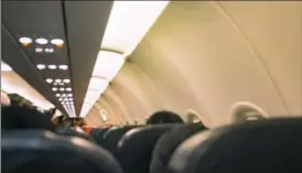  ?? Getty Images/iStockphot­o ?? Mythbuster: Travelers are less likely to get sick on an airplane than they are in other spaces. That’s because air is exchanged more frequently on the plane than it is in typical offices and school buildings.