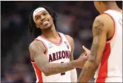  ?? CHRISTIAN PETERSEN – GETTY IMAGES ?? Caleb Love celebrates after Arizona defeated Dayton in the second round of the NCAA Tournament on Saturday.