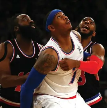  ?? ELSA/GETTY IMAGES ?? All-star teammates James Harden, left, and Chris Paul, right, will be reunited in Houston’s backcourt next season.