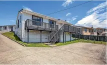  ??  ?? 56 Piko St sold for $492,000.