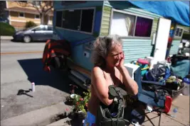  ?? ARIC CRABB — BAY AREA NEWS GROUP ?? Tami Rule stands outside the vehicle she inhabits along Sandpebble Drive in San Jose. She said she has mixed feelings about the city gathering footage of clusters of homeless people.