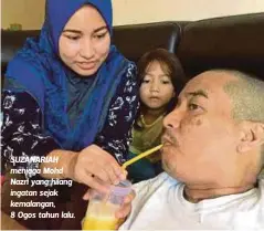  ??  ?? SUZANARIAH menjaga Mohd Nazri yang hilang ingatan sejak kemalangan, 8 Ogos tahun lalu.