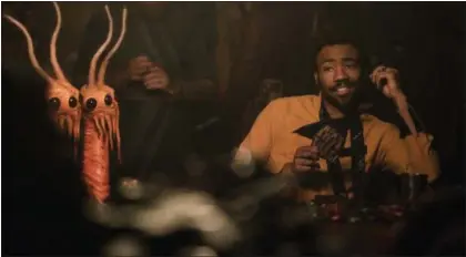  ?? LUCASFILM PHOTOS ?? Donald Glover slides nicely into the role of young Lando Calrissian in “Solo: A Star Wars Story.”