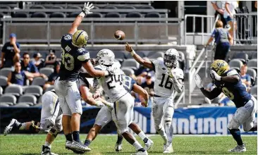  ?? JUSTIN BERL/GETTY IMAGES ?? Georgia Tech’s TaQuon Marshall was up and down on Saturday against Pittsburgh. He had a 20-yard pass for a first down at the end of the first half but also had a bad miss on fourth-and-5 that quarter.