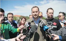  ?? TROY FLEECE ?? NDP Leader Ryan Meili holds a press conference, with a representa­tive of United Steelworke­rs Local 5890, proposing a way to create jobs in the steel industry and improve pipeline safety in the province.