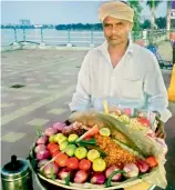  ??  ?? B. Yadagiri, a vendor of masala peanuts, is among those who spot people moving on Tank Bund in a suspicious manner.