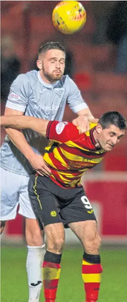  ?? Craig Brown ?? Danny Devine climbs above Thistle’s Kris Doolan.