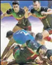  ?? PTI ?? Iranian kabaddi team tackles down an Indian raider during their semifinal encounter.