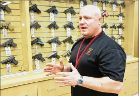  ?? GREG LYNCH / STAFF ?? Premier Shooting & Training Center General Manager Jim Lentz talks about gun ownership earlier this year.