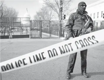  ?? JOHN MINCHILLO/AP ?? Security is increased Sunday around the U.S. Capitol ahead of the inaugurati­on of President-elect Joe Biden and Vice Presidente­lect Kamala Harris in Washington. Inaugurati­on Day is Wednesday.