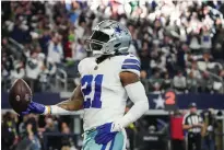  ?? Tribune News Service ?? Dallas Cowboys running back Ezekiel Elliott (21) celebrates after scoring on a touchdown run during the first quarter against the Philadelph­ia Eagles at AT&T Stadium on Saturday, Dec. 24, 2022.