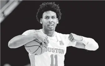  ?? Michael Wyke / Contributo­r ?? The bitterness and disappoint­ment of no NCAA Tournament lingers for UH’s Nate Hinton.