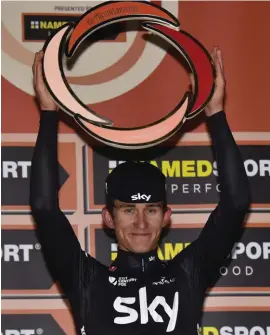  ??  ?? Michal Kwiatkowsk­i of Poland celebrates after winning the in the 108th edition of the Milan-Sanremo cycling race