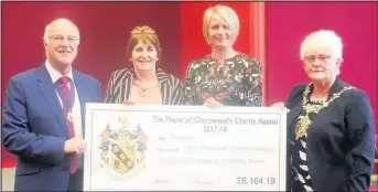  ??  ?? Pictured is a cheque being presented to MyAware, a national charity supporting people living with myasthenia, a group of rare neuromuscu­lar diseases characteri­sed by fluctuatin­g and sometimes fatal muscle weakness.