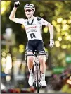  ??  ?? Denmark’s Soren Kragh Andersen crosses the finish line to win the 14th stage of the Tour de France cycling race over 194 km (120.5 miles) with start in Clermont-Ferrand and finish in Lyon, France on
Sept 12. (AP)