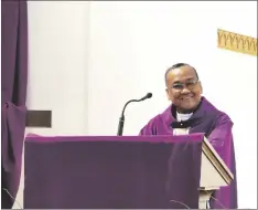  ?? ROMAN FLORES PHOTO ?? The Rev. Claro Ortiz smiles while giving a homily during a church celebratio­n for his 25 years ordained as a Catholic priest, on Saturday, March 16, in Brawley.