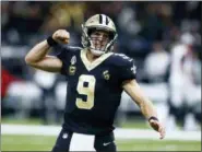  ?? BUTCH DILL — THE ASSOCIATED PRESS ?? In this Nov. 22, 2018, file photo, New Orleans Saints quarterbac­k Drew Brees reacts after throwing a touchdown pass during the first half of the team’s NFL football game against the Atlanta Falcons in New Orleans.