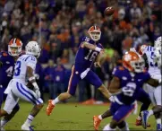  ?? RICHARD SHIRO — THE ASSOCIATED PRESS ?? Clemson quarterbac­k Trevor Lawrence passes against Duke last season in Clemson, S.C.