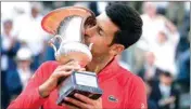  ?? ?? Serbia's Novak Djokovic kisses the trophy after winning the final match against Greece's Stefanos Tsitsipas at the Italian Open tennis tournament, in Rome, Sunday