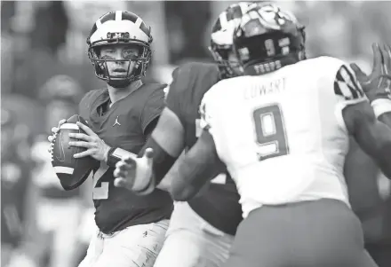  ?? GETTY IMAGES ?? Shea Patterson, a junior, is in his first season as the starting quarterbac­k at Michigan.