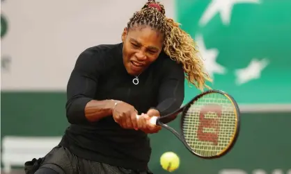  ?? Photograph: Julian Finney/Getty Images ?? Serena Williams plays a backhand during her first-round victory over Kristie Ahn.