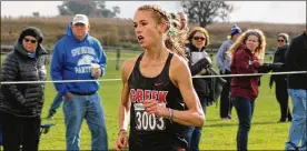  ?? CONTRIBUTE­D BY GREG BILLING ?? Beavercree­k junior Taylor Ewert won the Division I girls cross-country district championsh­ip in a course-record 17:13.93 on Saturday.