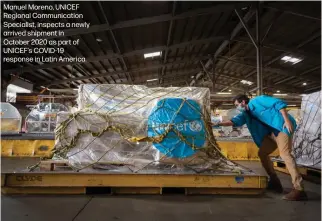  ?? ?? Manuel Moreno, UNICEF Regional Communicat­ion Specialist, inspects a newly arrived shipment in October 2020 as part of UNICEF's COVID-19 response in Latin America.