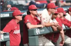  ?? NWA Democrat-Gazette/J.T. Wampler ?? NO FORTUNE TELLING: Arkansas’ head coach Dave Van Horn, left, watches from the dugout during the Hogs’ 10-9 win over Grand Canyon University on March 11 at Baum-Walker Stadium in Fayettevil­le.