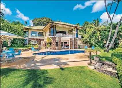  ?? Photograph­s courtesy of Hawaii Life Real Estate ?? IN HONOLULU, the Diamond Head estate of Jim Nabors, the late actor known for his Gomer Pyle character, is listed at $14.888 million. The half-acre-plus property includes 170 feet of bay frontage.