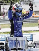  ?? GARY C.
KLEIN / THE
SHEBOYGAN
PRESS ?? IndyCar driver Felix Rosenqvist reacts after winning auto race two of the REV Group Grand Prix, Sunday at Road America in Elkhart Lake, Wis.