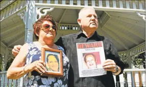  ?? Hearst Connecticu­t Media file photo ?? Dale Ocelik, left, holds a framed photograph of her big sister Nina Coe as Coe’s younger brother Michael Plourde displays the Silver Alert poster the family put up all over town after her disappeara­nce in 2015.