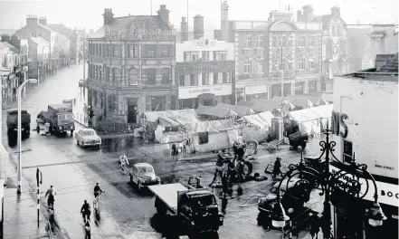  ??  ?? A bygone shot of Loughborou­gh and its market back in the late 1950s.