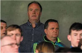  ?? SPORTSFILE ?? Wexford manager Davy Fitzgerald with county board chairman Derek Kent (behind) watching from the stands in O’Moore Park yesterday