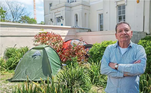 ??  ?? Furious: Robin Biggs is battling to evict the drifters who’ve set up camp at the historic West Sussex mansion where he lives
