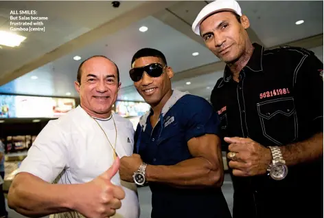  ?? Photo: CHRIS FARINA/TOP RANK ?? ALL SMILES: But Salas became frustrated with Gamboa [centre]