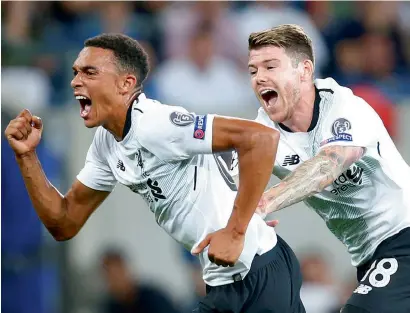  ?? Reuters ?? Liverpool’s Trent Alexander-Arnold celebrates scoring his goal against Hoffenheim during the Champions League match. —