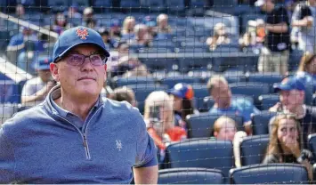  ?? MARY ALTAFFER / AP ?? New York Mets owner Steve Cohen looks on before the start of a game between the New York Mets and the Cincinnati Reds, in New York, last season. Cohen’s Mets finished with a record tax payroll of $374.7 million, according to figures finalized by MLB on Thursday, topping the L.A. Dodgers’ $291.1 million in 2015.