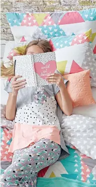  ??  ?? BED TIME: The new kids’ range at Penneys includes this geo-print duvet (€16) and rose god cushions (€12); below, bunny girl soft toys by Guadalupe Creations (€25) are available from KID