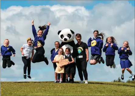  ??  ?? Sunnyside Ocean Defenders from Sunnyside Primary in Craigend celebrate their big WWF win