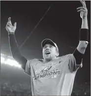  ?? AP/MATT SLOCUM ?? Philadelph­ia’s Nick Foles celebrates after the Eagles defeated the Minnesota Vikings in the NFC Championsh­ip Game on Sunday in Philadelph­ia. Foles threw for 352 yards and 3 touchdowns as the Eagles won 38-7 to advance to Super Bowl LII.