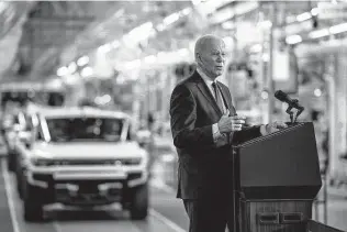  ?? Nic Antaya / Tribune News Service ?? President Joe Biden speaks at the General Motors Factory ZERO electric vehicle assembly plant on Wednesday in Detroit. Biden touted the benefits of the infrastruc­ture bill he recently signed.