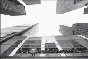  ?? CP PHOTO ?? A Bank of Montreal sign is shown in the financial district in Toronto in August, 2017. BMO is warning that “fraudsters” from outside of the country may have accessed certain personal and financial informatio­n of some of its customers. The bank says...