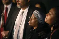  ?? DAVID ZALUBOWSKI — THE ASSOCIATED PRESS ?? A tear runs down the cheek of Sheneen McClain as she is consoled by Omar Montgomery, president of the Aurora NAACP, outside the Adams County Colo., Justice Center, after a verdict was rendered in the killing of her son Elijah McClain, Friday, Dec. 22, 2023, in Brighton, Colo. Two paramedics were convicted in the 2019 killing of McClain, who they injected with an overdose of the sedative ketamine after police put him in a neck hold.