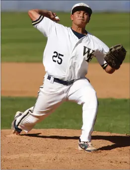  ?? Katharine Lotze/The Signal ?? West Ranch’s David Montalban (25) throws a pitch during a baseball game against Moorpark on Monday at West Ranch High School. West Ranch won 3-0.