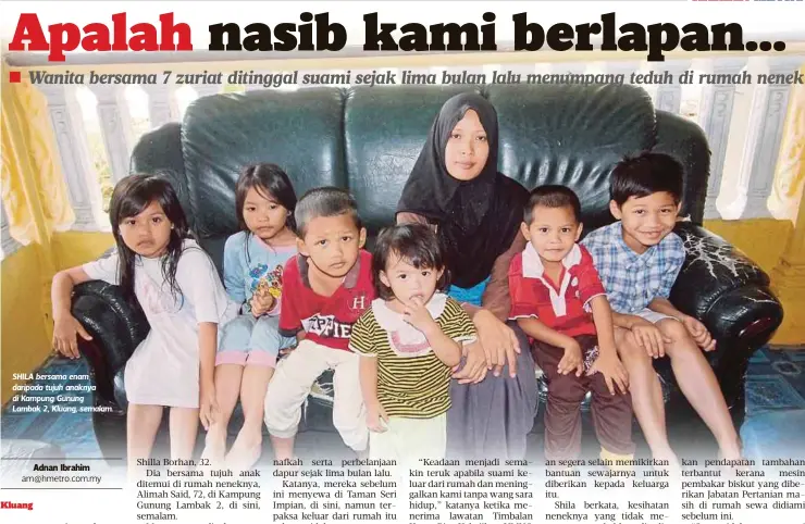  ??  ?? SHILA bersama enam daripada tujuh anaknya di Kampung Gunung
Lambak 2, Kluang, semalam.