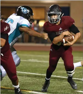  ?? RECORDER PHOTOS BY CHIEKO HARA ?? Right: Granite Hills High School's Jasper Berumen runs with the ball Thursday during the first half at Jacob Rankin Stadium in Portervill­e.