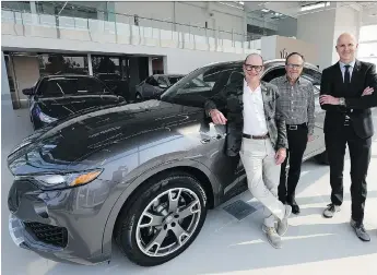  ?? MICHELLE BERG ?? Vaughn Wyant, left, is hoping to appeal to buyers looking for luxury with his Maserati/Alfa Romeo dealership in Stonebridg­e. At right is Richard Trevisan, head of Maserati Canada and Brian Kelly, dealership GM.