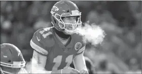  ?? AP/REED HOFFMAN ?? Alex Smith is 1-3 in the playoffs as the Kansas City Chiefs’ quarterbac­k, and no other team has given him more fits than the Tennessee Titans, whom the Chiefs face Saturday.