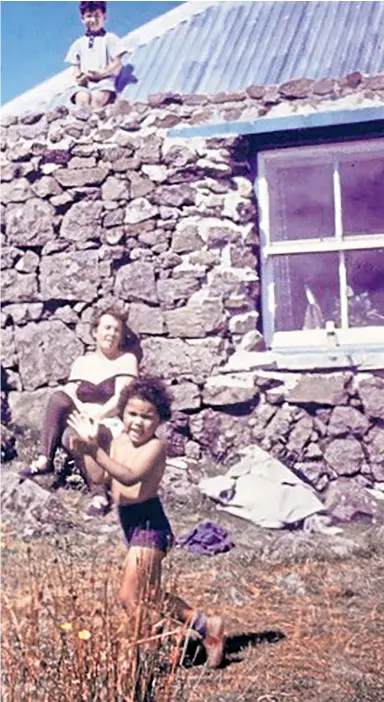  ??  ?? Mum Helen and brother Maxwell, on the roof, watch Jackie play as a child on holiday on Mull in 1965; and, inset, her parents planted a cherry blossom tree when they adopted her brother