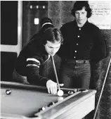  ??  ?? Or pool? Elgan Rees at the table as JJ Williams watches